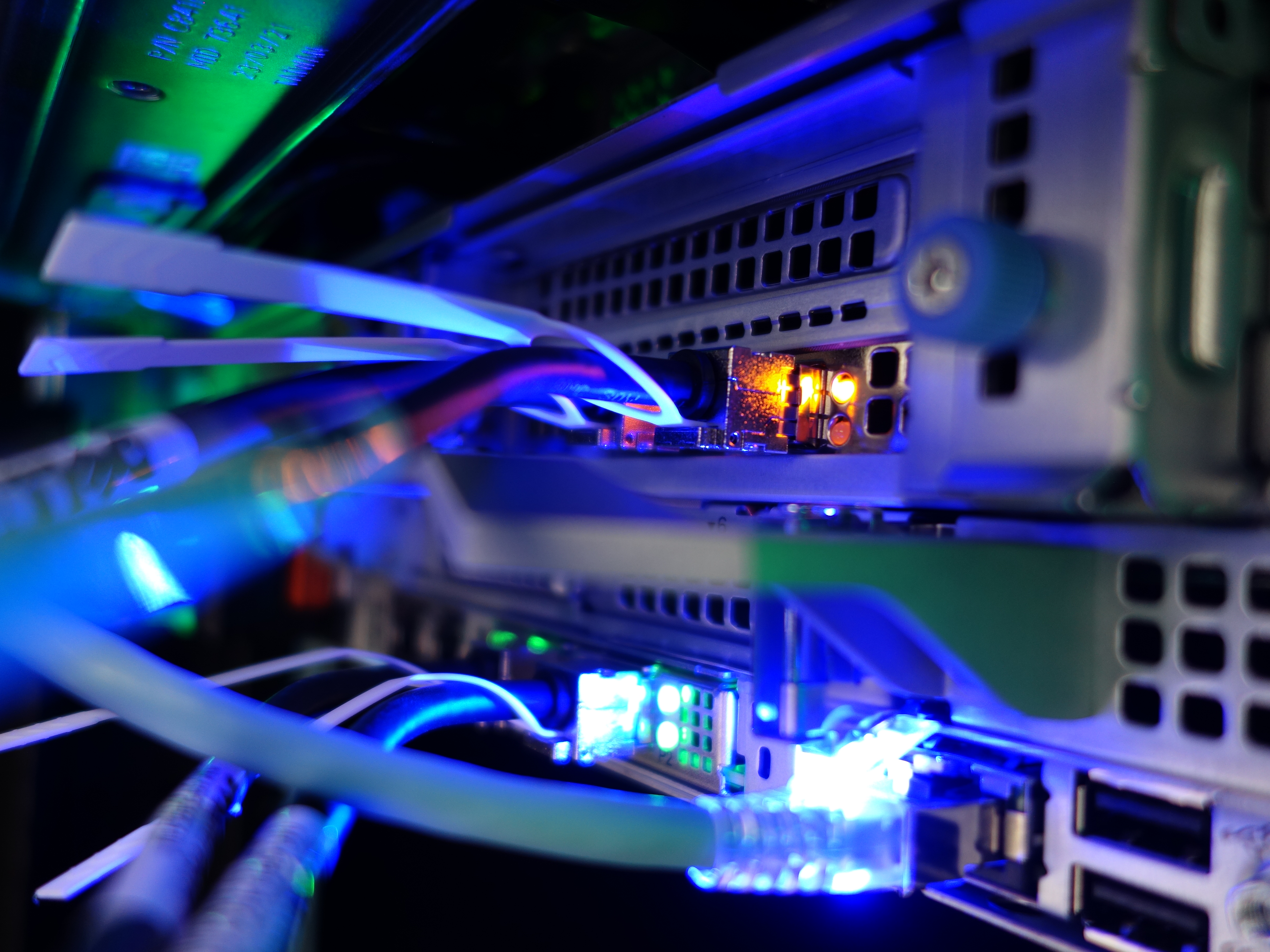 vecteezy_network-cables-connected-to-switch-closeup-of-data-center_48046547